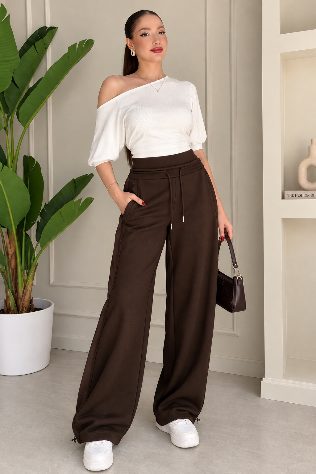 pantalon coupe ample et une taille haute