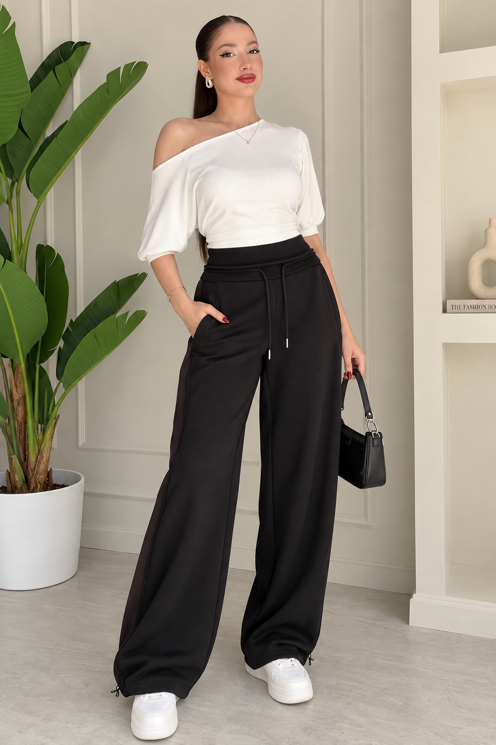 pantalon coupe ample et une taille haute