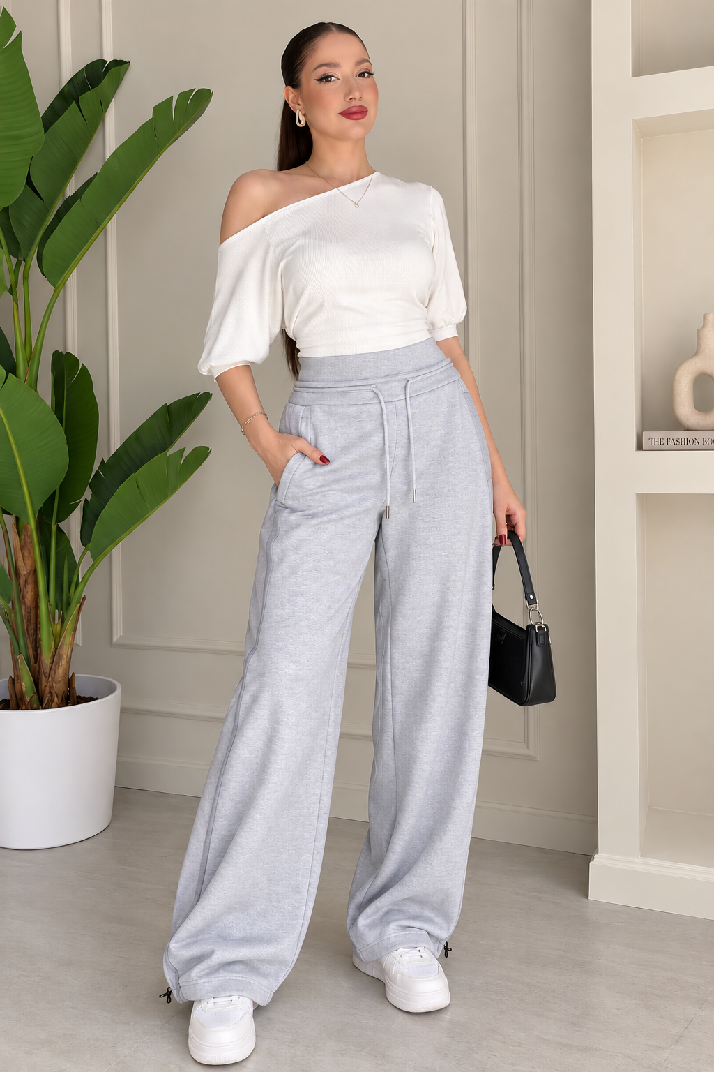 pantalon coupe ample et une taille haute